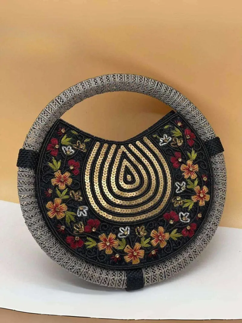Unique Shaped Circular Whirl Handbag with Intricate Embroidery view 7