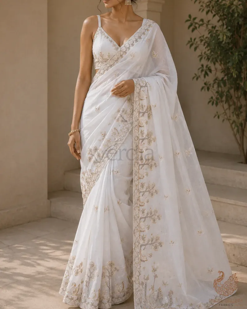 White Muslin Saree with Zari, Cutdana, Bead, and Sequins Work featuring a Duck Motif Border.