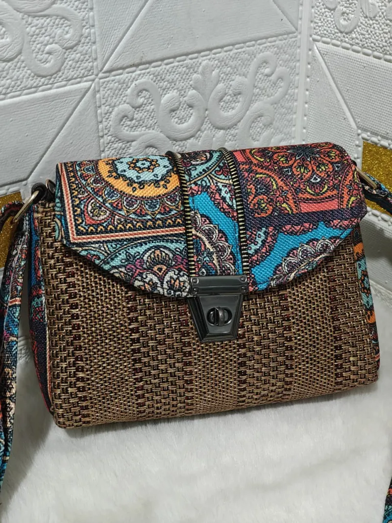The Roller Sling Handbag