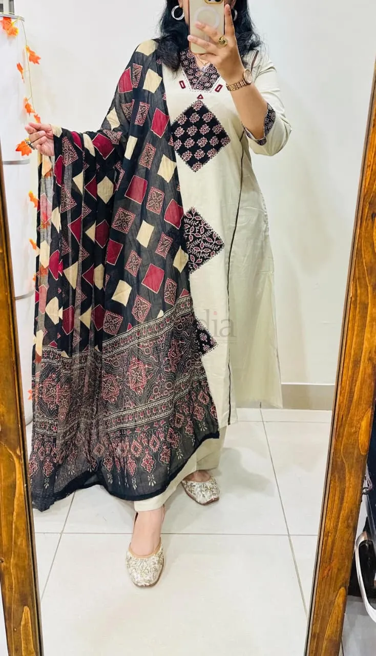 Premium Dhabu Cotton Suit with Azrakh Applique and real mirror work.