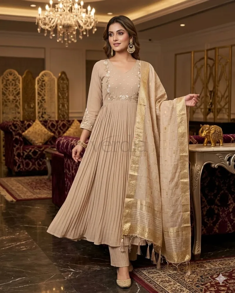 Pure Mal Chanderi fabric with intricate handwork detailing.
