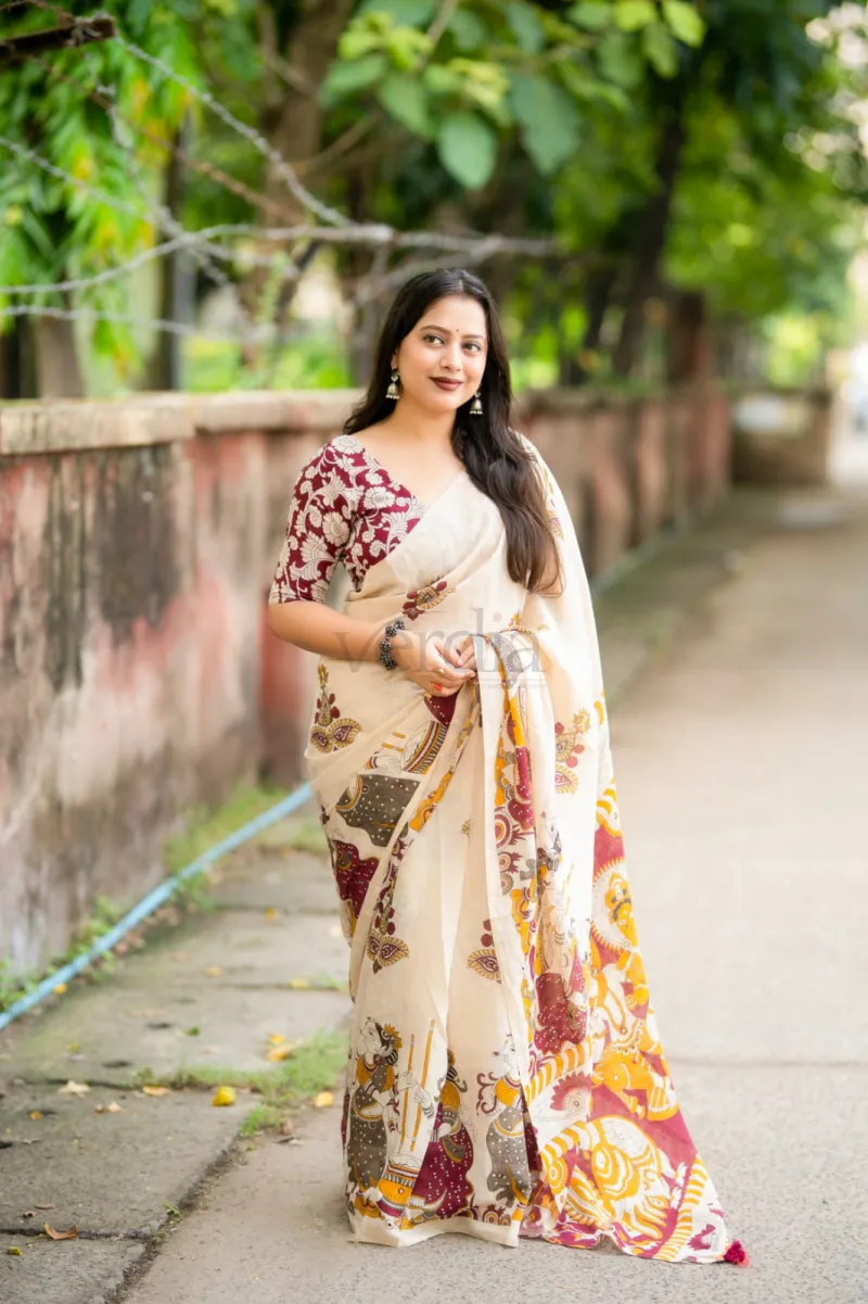 Soft linen saree with elegant kalamkari style prints.