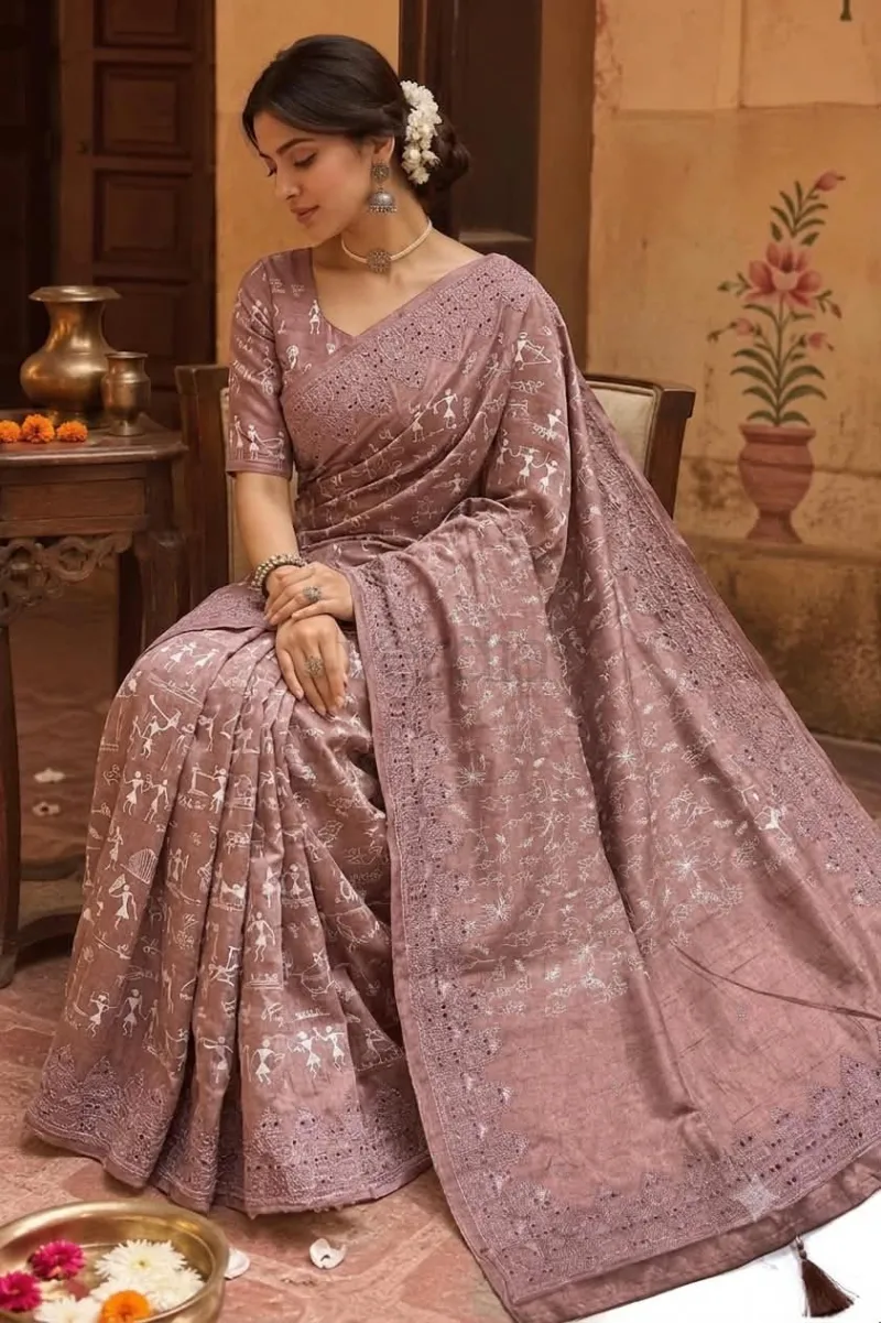 Tussar Silk Saree with Warli Art prints and embroidered cut work border.